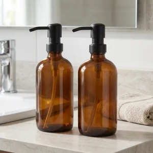 2 st tvålpumpar i bärnstensfärgat glas